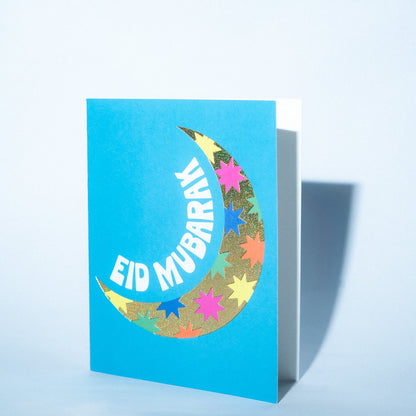 Greeting card with 'Eid Mubarak' on a blue background