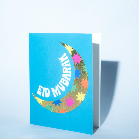 Greeting card with 'Eid Mubarak' on a blue background