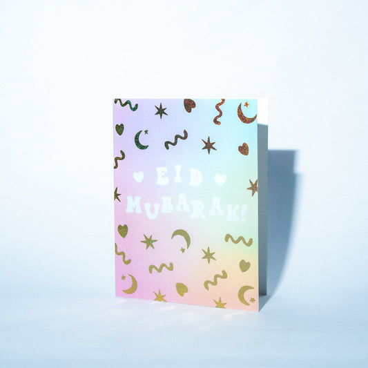 Pastel gradient notebook with decorative patterns on a light blue background