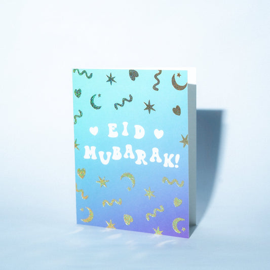 Greeting card with 'Kid Mubarak!' text on a gradient blue background
