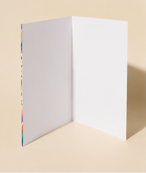 Colorful 'Mubarak!' greeting cards with floral designs on a beige background.