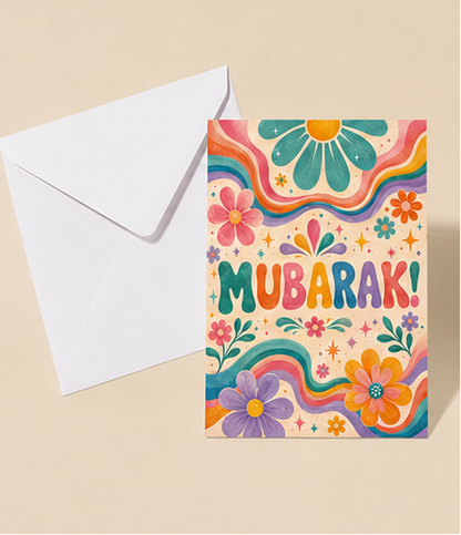 Colorful 'Mubarak!' greeting cards with floral designs on a beige background.