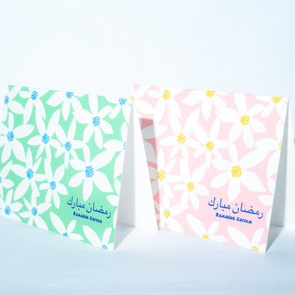 Two floral-patterned greeting cards 