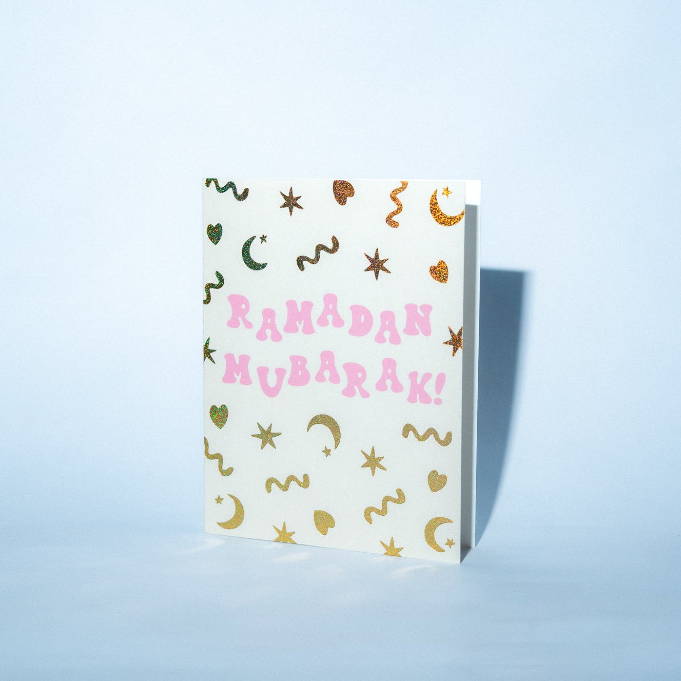 Card  with 'Ramadan Mubarak!' text on a light blue background