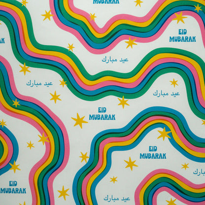 Colorful pattern with 'Eid Mubarak' text and stars on a white background